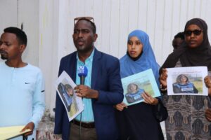 Abdalle Ahmed Mumin, the Secretary-General of Somali Journalists Syndicate (SJS) speaks during the protest in Mogadishu on Friday, 13 May, 2022. | PHOTO/SJS.